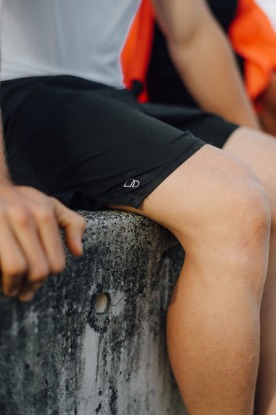 The black mens zephyr short will protect you in light showers whilst repealing sweat. Black Zephyr shorts built by kiwi's for kiwi's.